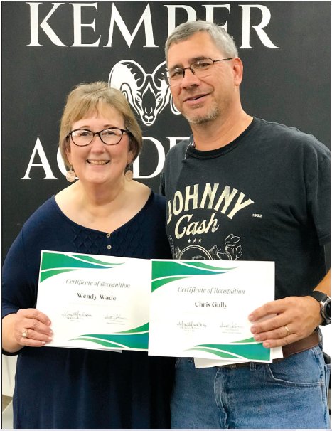 Kindergarten teacher Wendy Wade and junior high instructor Chris Gully received Kemper Academy’s “Making A Difference” Award for teachers for the first term of the school year.