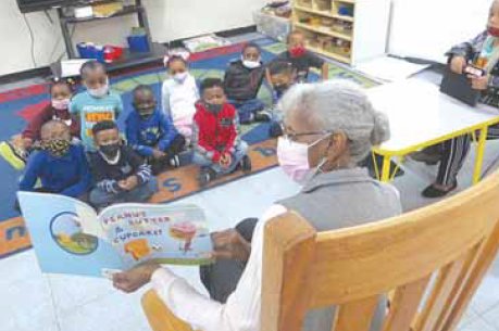 Iris Roberts reads to a pre-kindergarten class at Kemper County Lower Elementary School in Scooba.