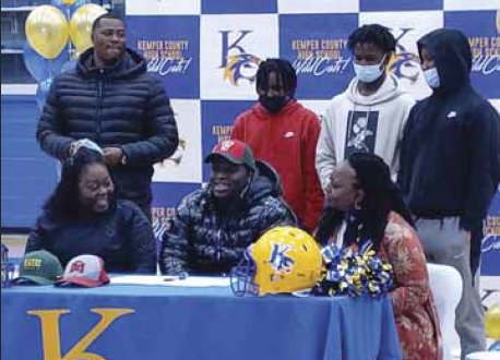 EJ Jackson pictured with Brenda Marshall, Keyon Marshall, Demarcus Bester, Rickie Little, Lacoltan Bester, and Margaret Jackson.